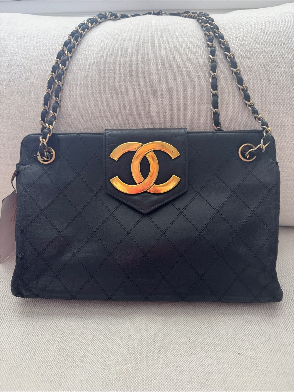CHANEL Black Quilted Leather Shoulder Bag with Gold CC Emblem